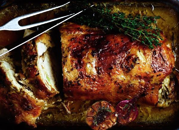 Roasted chicken Kiev with grapes and garlic sauce